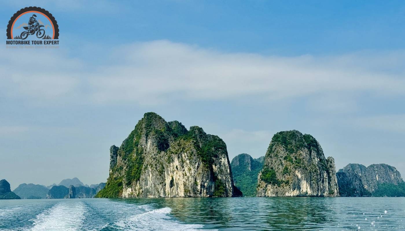 Ha Long Bay's mystical caves illuminated by rays of light piercing through the winter mist.