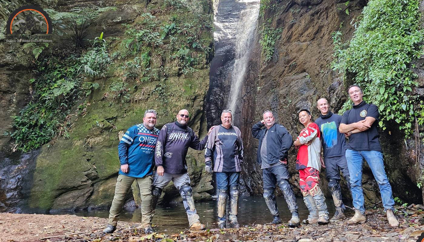 Motorbike riders immerse in the magnificence of Love Waterfall