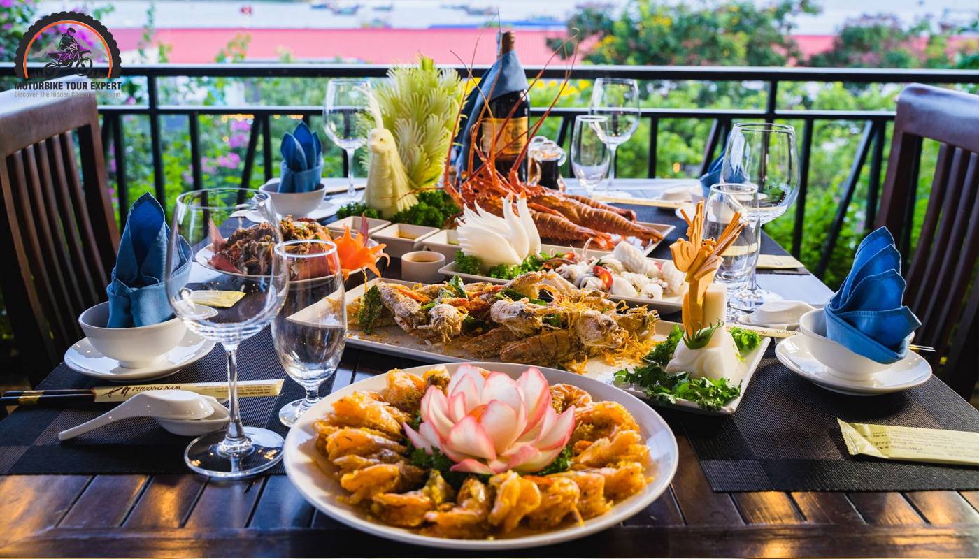 Enjoy Cuisine At 10 Best Restaurants In Ninh Binh|A comfortable hostel ambiance with a lively bar and a kitchen|The delectable cuisine served here is a standout feature|Chookie's Beer Garden caters to beer aficionados seeking both premium craft brews|Hoang Giang Restaurant features savory scorched rice dishes|Each dish is prepared by the chef's skilled hands using fresh ingredients daily|The goat meat undergoes careful marination to ensure both cleanliness and hygiene|Ba Cửa restaurant offers an exceptionally diverse menu |Dat Set Restaurant shines among goat meat specialty restaurants|Thang Long's extensive menu features over 200 goat-centric dishes|Goat meat takes center stage in Ninh Binh cuisine|Our knowledgeable guides will lead you to hidden natural treasures 