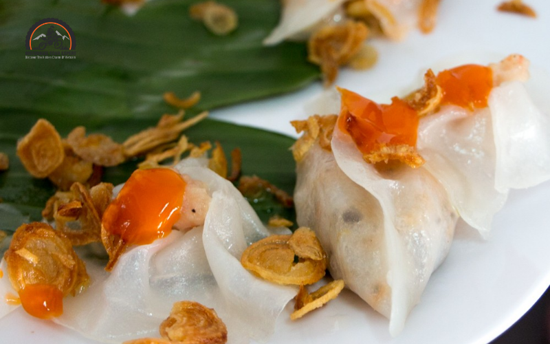 White Rose Dumplings (bánh bao bánh vạc) are delicate, translucent shrimp dumplings shaped like white roses