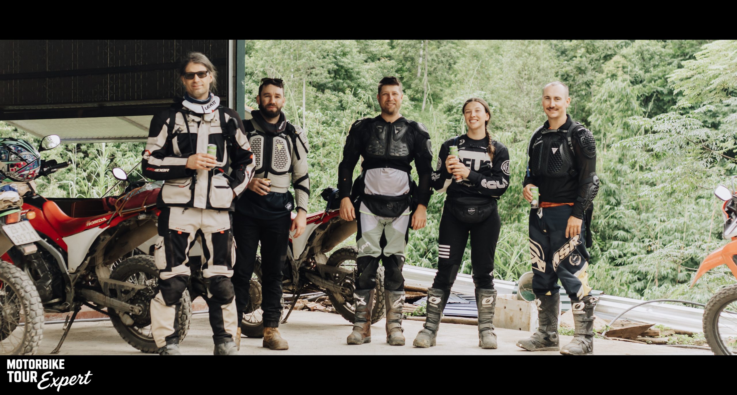 Experienced local motorcycle tour team with riders and motorbikes in Vietnam.