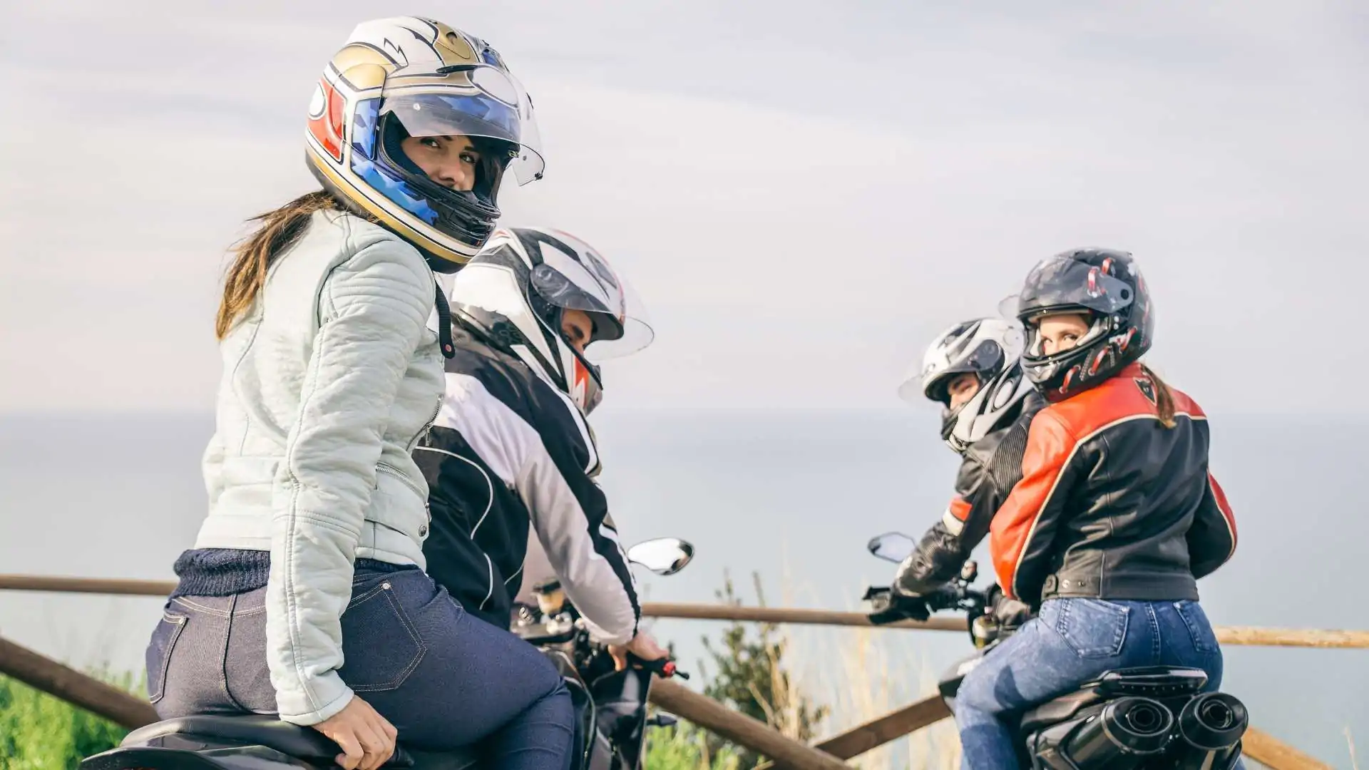 Group of riders wearing helmets preparing for a motorbike adventure in Northern Vietnam.